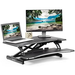 Black desk converter with laptop and monitor