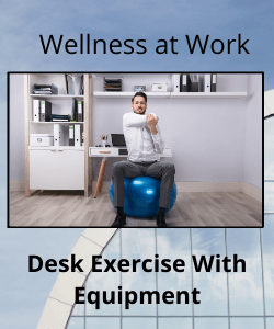Text reading "Wellness at Work, Desk Exercise With Equipment" and image of a man sitting on an exercise ball doing arm stretches