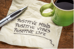 Napkin with writing on reading positive mind, positive vibes, positive life