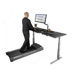 Man walking on imovr treadmill whilst working