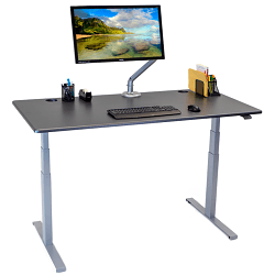 Electric standing desk with grey fram and brown desktop with keyboard, monitor and accessories