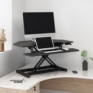 FlexiSpot M7C corner riser with monitor, laptop and mouse