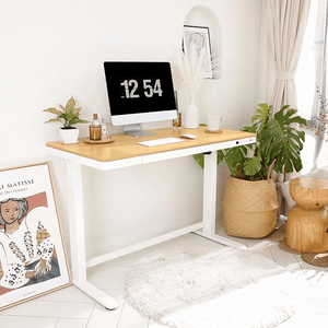 FlexiSpot Comhar standing desk with light wood top and white frame