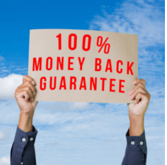 Hands holding a sign reading "100% money back guarantee"