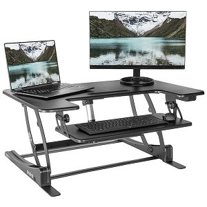 Two tier electric standing desk converter with keyboard, mouse, laptop and monitor