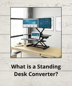Sit stand workstation with double monitors and a laptop above text which reads "What is a Standing Desk Converter?"
