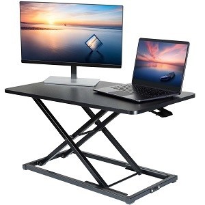 Single tier desk riser from WOKA with monitor and laptop