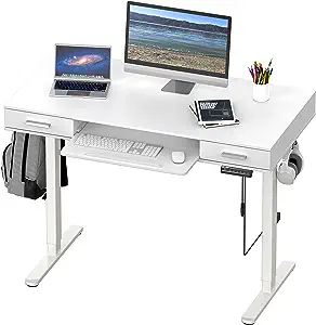 White electric standing desk with drawers and keyboard tray.